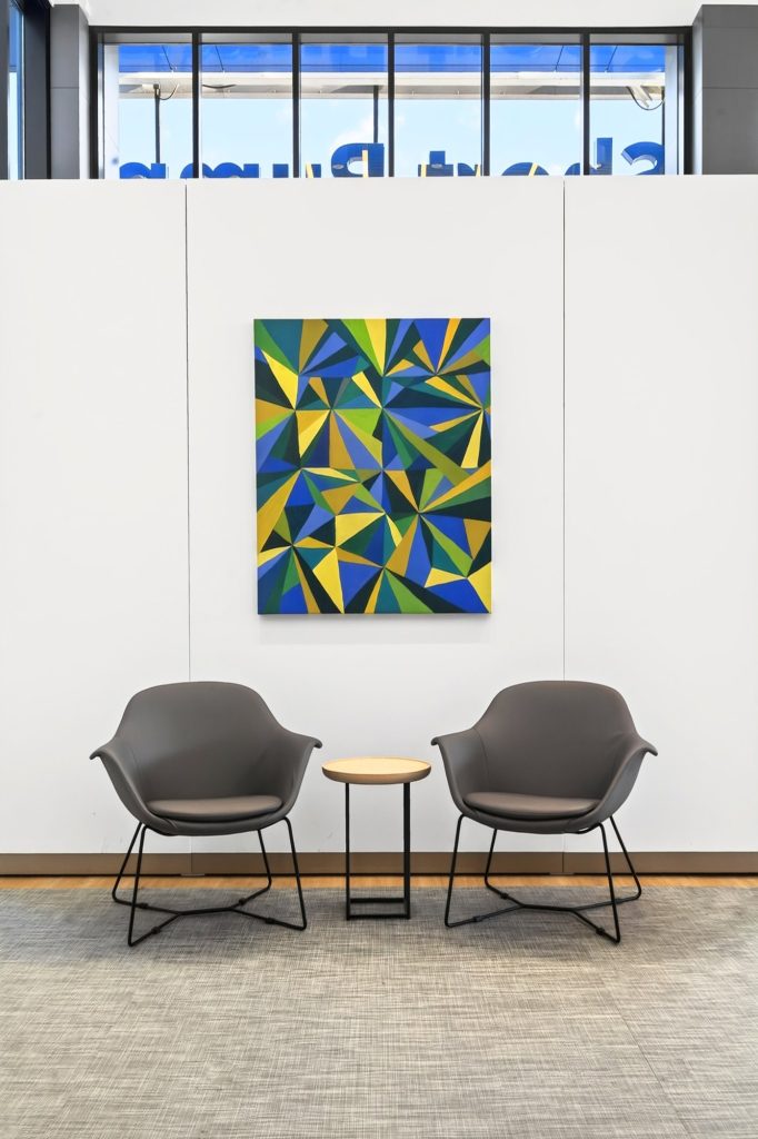 Two lounge chairs beneath a framed print, Honda dealership showroom, Short Pump, Virginia