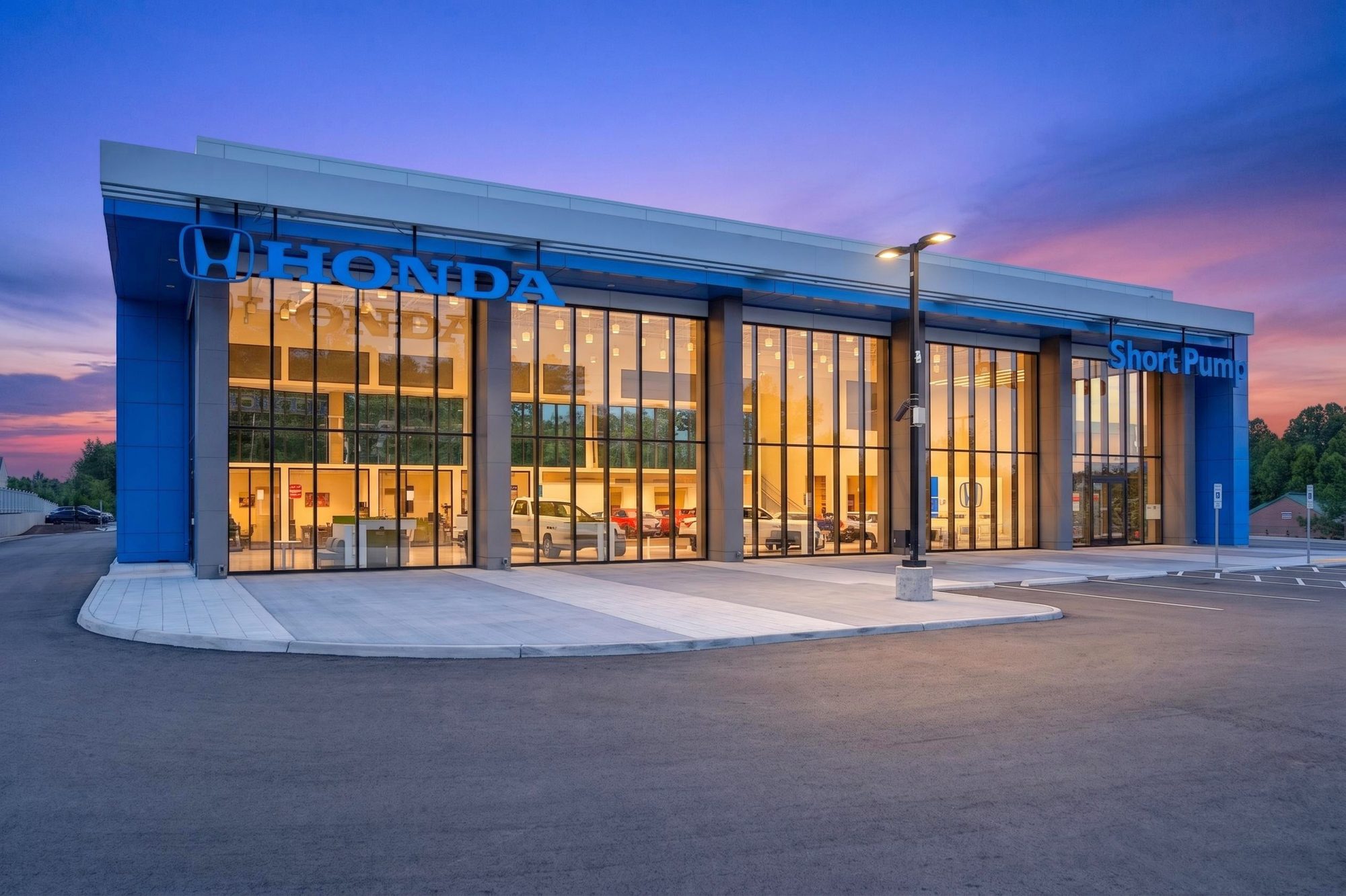 Honda dealership exterior at twilight, Short Pump, Virginia